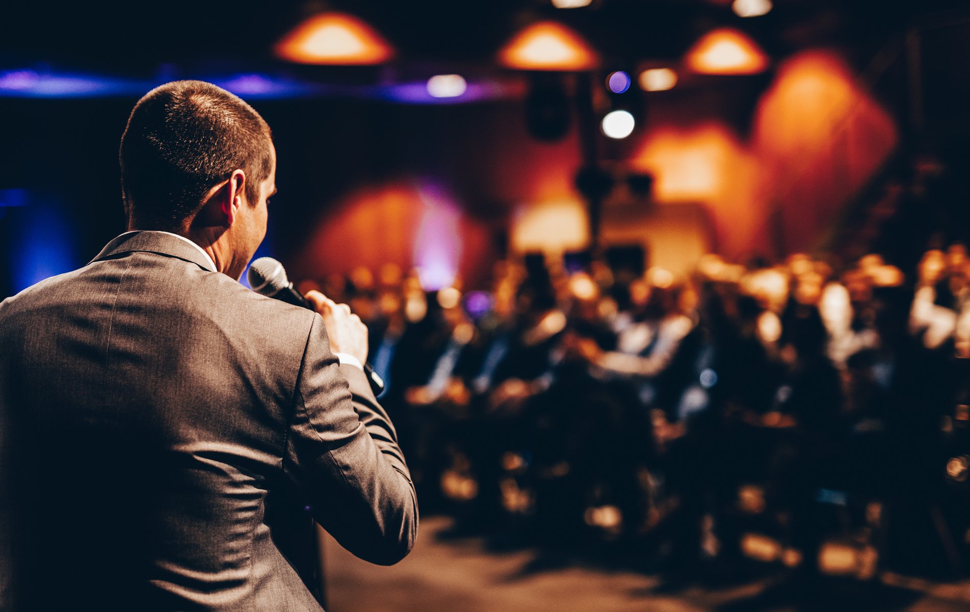 Public Speaker Giving Talk at Business Event.